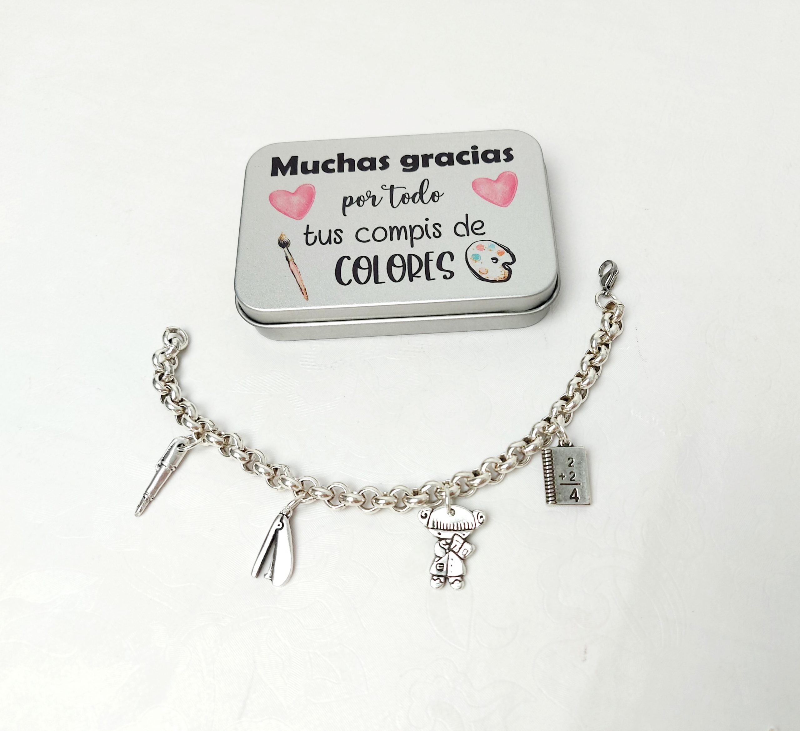 Pulsera baño plata. 4 Abalorios