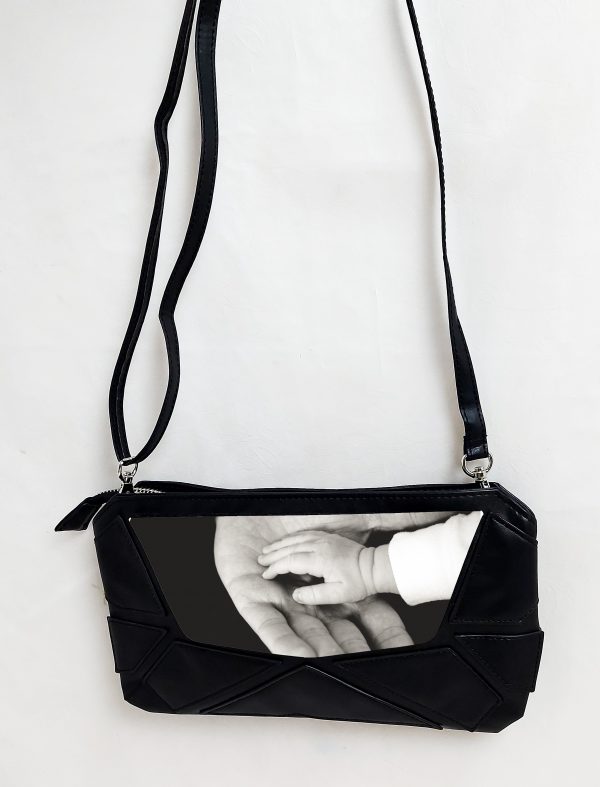Bolso mano triangulos