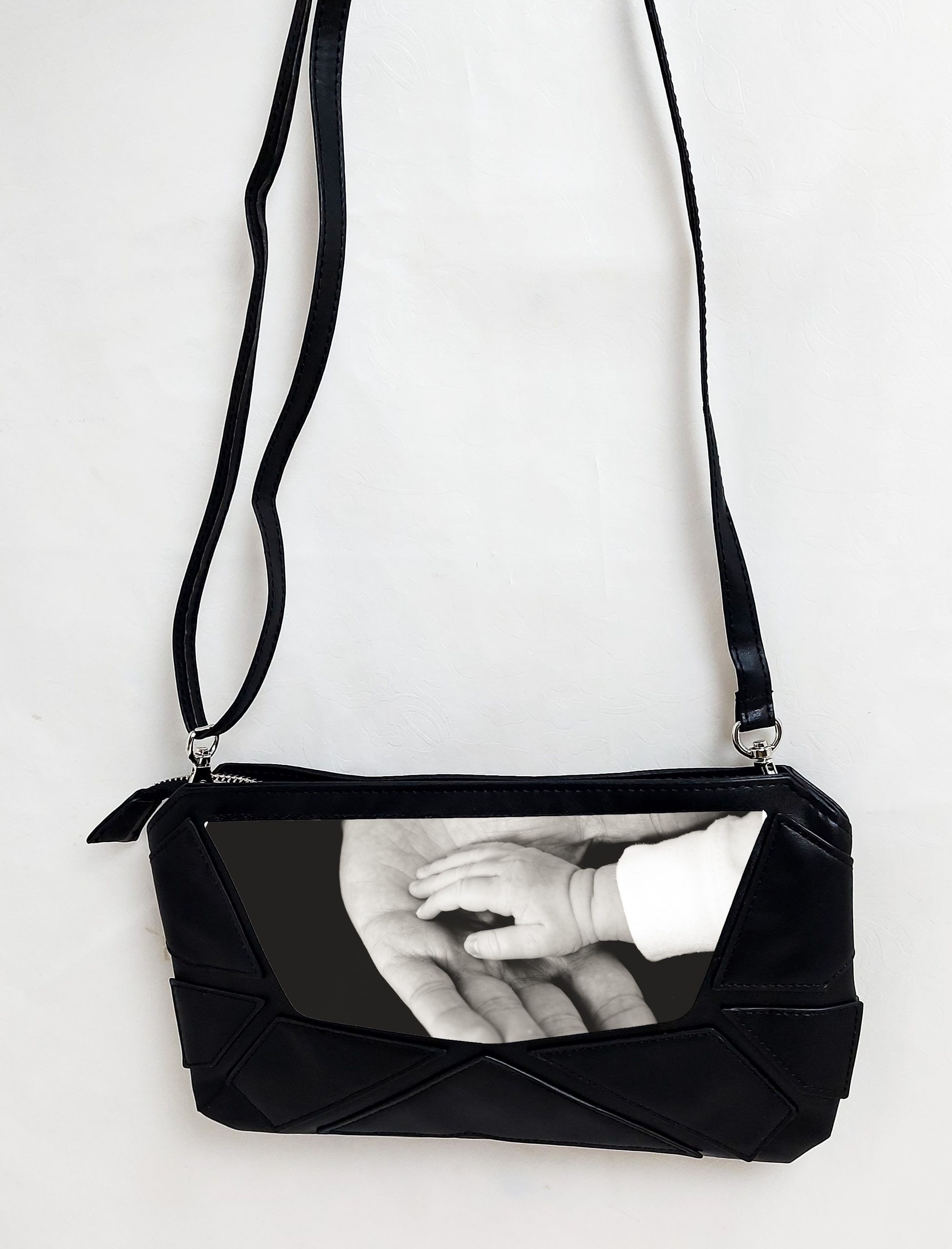 Bolso mano triangulos