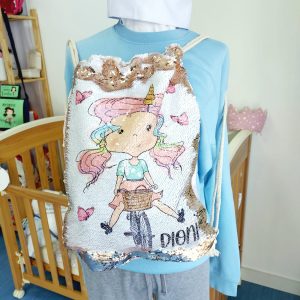 Mochila lentejuelas doradas