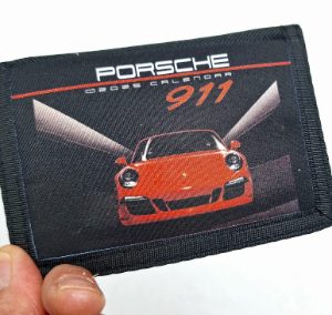 monedero niño coche