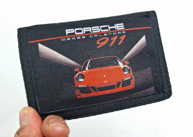 monedero niño coche