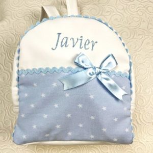 mochila tela azul bordada